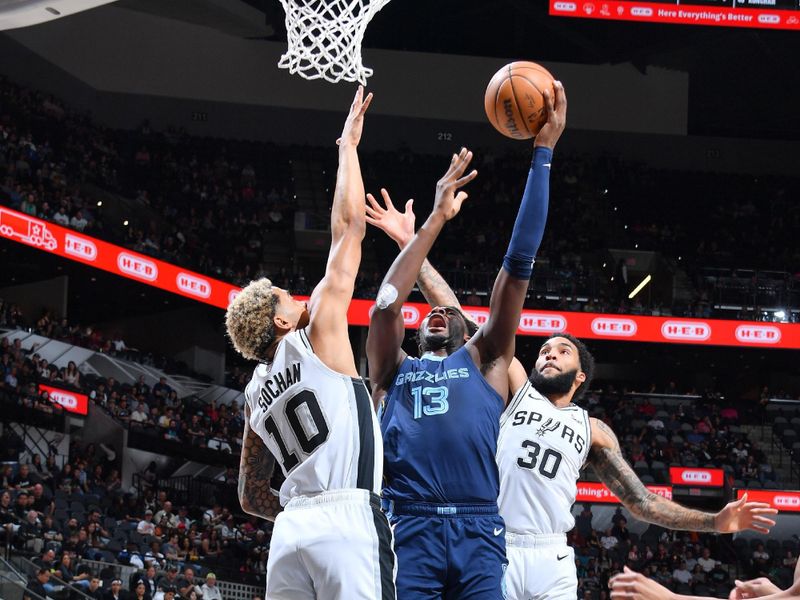 SAN ANTONIO, TX - MARCH 22  Jaren Jackson Jr. #13 of the Memphis Grizzlies drives to the basket during the game again the San Antonio Spurs on March 22, 2024 at the Frost Bank Center in San Antonio, Texas. NOTE TO USER: User expressly acknowledges and agrees that, by downloading and or using this photograph, user is consenting to the terms and conditions of the Getty Images License Agreement. Mandatory Copyright Notice: Copyright 2024 NBAE (Photos by Michael Gonzales/NBAE via Getty Images)