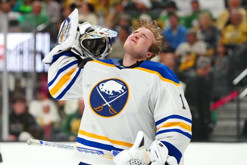 Mar 17, 2026; Las Vegas, Nevada, USA; Buffalo Sabres goaltender Ukko-Pekka Luukkonen (1) puts his mask back on during the second period against the Vegas Golden Knights at T-Mobile Arena. Mandatory Credit: Stephen R. Sylvanie-Imagn Images