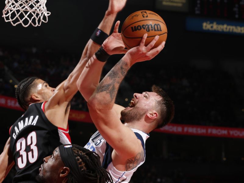 PORTLAND, OR - DECEMBER 1: Luka Doncic #77 of the Dallas Mavericks shoots the ball during the game against the Portland Trail Blazers on December 1, 2024 at the Moda Center Arena in Portland, Oregon. NOTE TO USER: User expressly acknowledges and agrees that, by downloading and or using this photograph, user is consenting to the terms and conditions of the Getty Images License Agreement. Mandatory Copyright Notice: Copyright 2024 NBAE (Photo by Cameron Browne/NBAE via Getty Images)