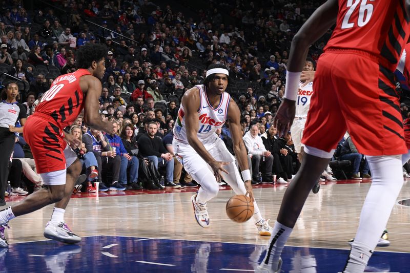 PHILADELPHIA, PA - MARCH 3:   Ricky Council IV #14 of the Philadelphia 76ers dribbles the ball during the game against the Portland Trail Blazers on March 3, 2025 at the Wells Fargo Center in Philadelphia, Pennsylvania NOTE TO USER: User expressly acknowledges and agrees that, by downloading and/or using this Photograph, user is consenting to the terms and conditions of the Getty Images License Agreement. Mandatory Copyright Notice: Copyright 2025 NBAE (Photo by David Dow/NBAE via Getty Images)