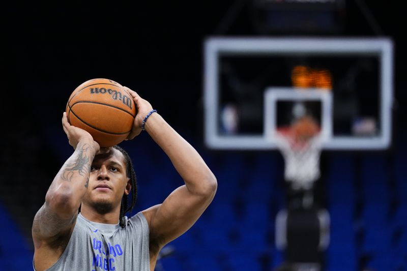 ORLANDO, FLORIDA - FEBRUARY 10: Paolo Banchero #5 of the Orlando Magic warms up prior to a game against the Chicago Bulls at Kia Center on February 10, 2024 in Orlando, Florida. NOTE TO USER: User expressly acknowledges and agrees that, by downloading and or using this photograph, user is consenting to the terms and conditions of the Getty Images License Agreement. (Photo by Rich Storry/Getty Images)