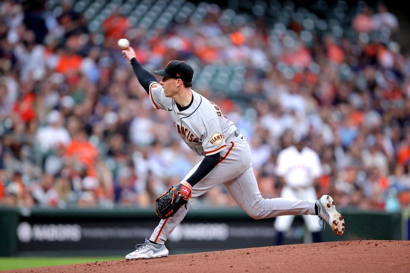 May 2, 2023; Houston, Texas, USA; San Francisco Giants starting pitcher Anthony DeSclafani (26) delivers a pitch against the Houston Astros during the first inning at Minute Maid Park. Mandatory Credit: Erik Williams-USA TODAY Sports