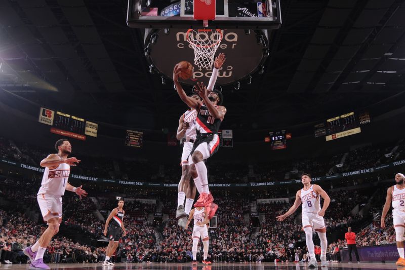 PORTLAND, OR - JANUARY 14: Scoot Henderson #00 of the Portland Trail Blazers drives to the basket during the game against the Phoenix Suns on January 14, 2024 at the Moda Center Arena in Portland, Oregon. NOTE TO USER: User expressly acknowledges and agrees that, by downloading and or using this photograph, user is consenting to the terms and conditions of the Getty Images License Agreement. Mandatory Copyright Notice: Copyright 2024 NBAE (Photo by Cameron Browne/NBAE via Getty Images)