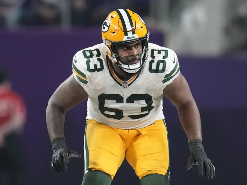 Green Bay Packers offensive tackle Rasheed Walker (63) in action during the second half of an NFL football game against the Minnesota Vikings, Sunday, Dec. 31, 2023, in Minneapolis. (AP Photo/Abbie Parr)