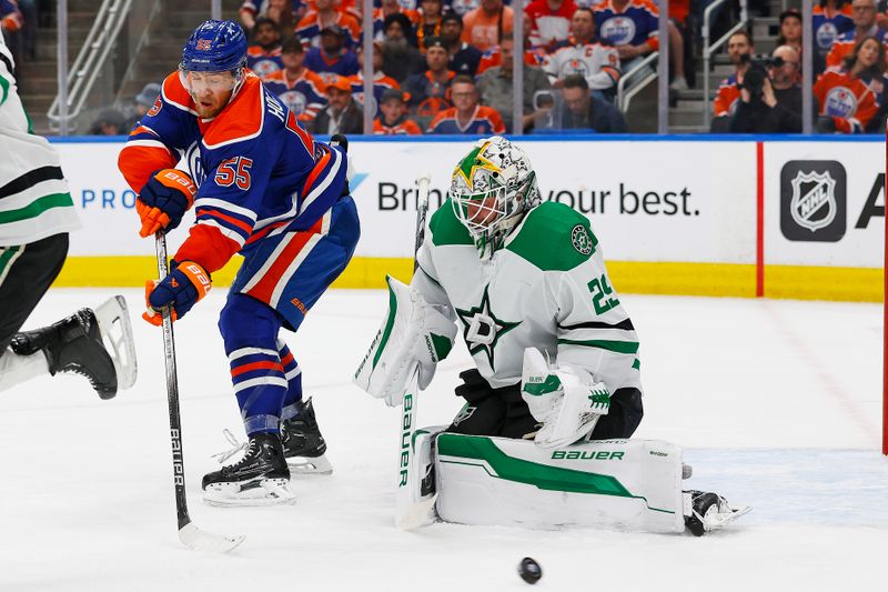 May 29, 2024; Edmonton, Alberta, CAN; Edmonton Oilers forward Dylan Holloway (55) deflects a shot just wide of Dallas Stars goaltender Jake Oettinger (29) during the first period in game four of the Western Conference Final of the 2024 Stanley Cup Playoffs at Rogers Place. Mandatory Credit: Perry Nelson-USA TODAY Sports