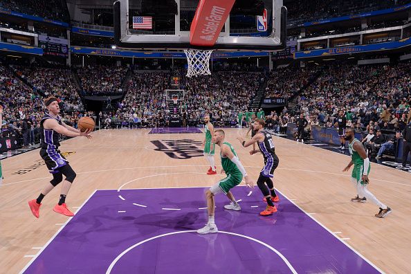 SACRAMENTO, CA - DECEMBER 20:  Kevin Huerter #9 of the Sacramento Kings goes to the basket during the game on December 20, 2023 at Golden 1 Center in Sacramento, California. NOTE TO USER: User expressly acknowledges and agrees that, by downloading and or using this Photograph, user is consenting to the terms and conditions of the Getty Images License Agreement. Mandatory Copyright Notice: Copyright 2023 NBAE (Photo by Rocky Widner/NBAE via Getty Images)