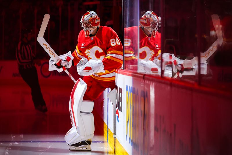 Sep 28, 2024; Calgary, Alberta, CAN; Calgary Flames goaltender Dan Vladar (80) takes the ice prior to the game against the Vancouver Canucks during the first period at Scotiabank Saddledome. Mandatory Credit: Sergei Belski-Imagn Images