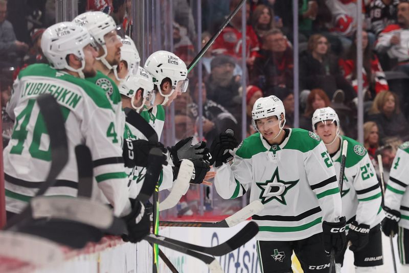 Dec 3, 2025; Newark, New Jersey, USA; Dallas Stars left wing Jason Robertson (21) celebrates his goal against the New Jersey Devils during the second period at Prudential Center. Mandatory Credit: Ed Mulholland-Imagn Images