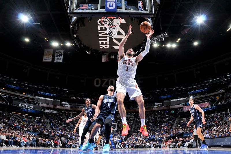 ORLANDO, FL - JANUARY 22: Max Strus #1 of the Cleveland Cavaliers grabs a rebound during the game against the Orlando Magic on January 22, 2024 at Kia Center in Orlando, Florida. NOTE TO USER: User expressly acknowledges and agrees that, by downloading and or using this photograph, User is consenting to the terms and conditions of the Getty Images License Agreement. Mandatory Copyright Notice: Copyright 2024 NBAE (Photo by Fernando Medina/NBAE via Getty Images)