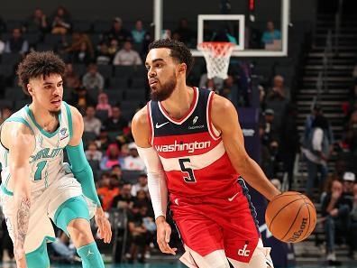 CHARLOTTE, NC - NOVEMBER 22: Tyus Jones #5 of the Washington Wizards drives to the basket during the game against the Charlotte Hornets on November 22, 2023 at Spectrum Center in Charlotte, North Carolina. NOTE TO USER: User expressly acknowledges and agrees that, by downloading and or using this photograph, User is consenting to the terms and conditions of the Getty Images License Agreement. Mandatory Copyright Notice: Copyright 2023 NBAE (Photo by Kent Smith/NBAE via Getty Images)