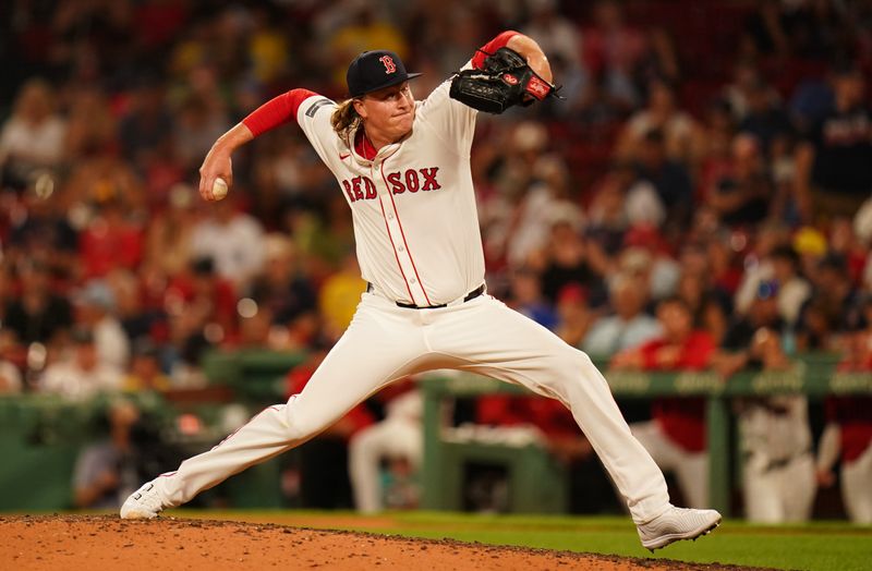 Jul 9, 2024; Boston, Massachusetts, USA; Boston Red Sox relief pitcher Trey Wingenter (61) throws a pitch against the Oakland Athletics in the ninth inning at Fenway Park. Mandatory Credit: David Butler II-USA TODAY Sports