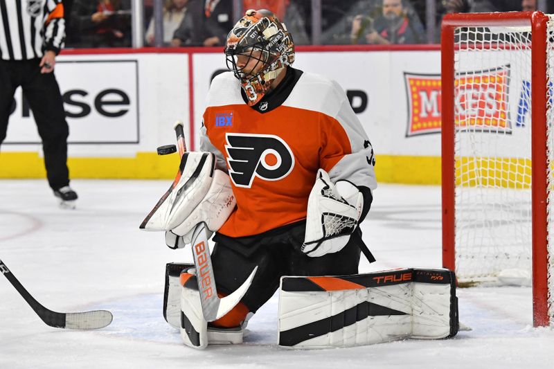 Jan 4, 2024; Philadelphia, Pennsylvania, USA;  Philadelphia Flyers goaltender Samuel Ersson (33) makes a save against the Columbus Blue Jackets during the second period at Wells Fargo Center. Mandatory Credit: Eric Hartline-USA TODAY Sports