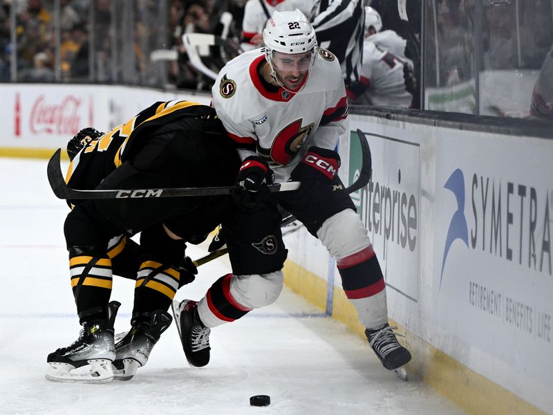 Nov 9, 2024; Boston, Massachusetts, USA; Boston Bruins defenseman Charlie McAvoy (73) checks Ottawa Senators right wing Michael Amadio (22) into the boards during the second period at TD Garden. Mandatory Credit: Brian Fluharty-Imagn Images