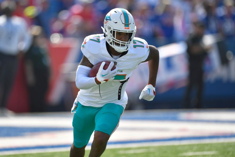 Miami Dolphins wide receiver Jaylen Waddle (17) warms up prior to an NFL football game against the Buffalo Bills, Sunday, Oct. 1, 2023, in Orchard Park, N.Y. (AP Photo/Adrian Kraus)