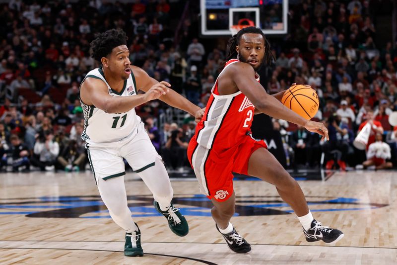 Mar 10, 2023; Chicago, IL, USA; Ohio State Buckeyes guard Bruce Thornton (2) drives to the basket against Michigan State Spartans guard A.J. Hoggard (11) during the first half at United Center. Mandatory Credit: Kamil Krzaczynski-USA TODAY Sports