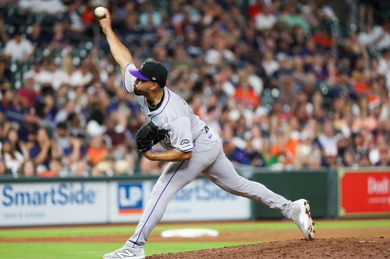 Jun 25, 2024; Houston, Texas, USA; Colorado Rockies relief pitcher Anthony Molina (43) pitches against the Houston Astros in the eighth inning at Minute Maid Park. Mandatory Credit: Thomas Shea-USA TODAY Sports