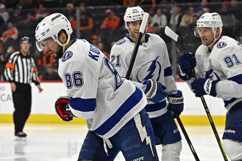 Jan 23, 2024; Philadelphia, Pennsylvania, USA; Tampa Bay Lightning right wing Nikita Kucherov (86) skates back to the bench after scoring a goal against the Philadelphia Flyer during the second period at Wells Fargo Center. Mandatory Credit: Eric Hartline-USA TODAY Sports