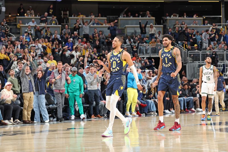 INDIANAPOLIS, IN - JANUARY 3: Tyrese Haliburton #0 of the Indiana Pacers celebrates during the game against the Milwaukee Bucks  on January 3, 2024 at Gainbridge Fieldhouse in Indianapolis, Indiana. NOTE TO USER: User expressly acknowledges and agrees that, by downloading and or using this Photograph, user is consenting to the terms and conditions of the Getty Images License Agreement. Mandatory Copyright Notice: Copyright 2024 NBAE (Photo by Jeff Haynes/NBAE via Getty Images)