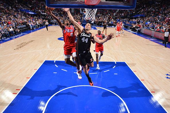 PHILADELPHIA, PA - DECEMBER 15: Tyrese Maxey #0 of the Philadelphia 76ers drives to the basket during the game against the Detroit Pistons on December 15, 2023 at the Wells Fargo Center in Philadelphia, Pennsylvania NOTE TO USER: User expressly acknowledges and agrees that, by downloading and/or using this Photograph, user is consenting to the terms and conditions of the Getty Images License Agreement. Mandatory Copyright Notice: Copyright 2023 NBAE (Photo by Jesse D. Garrabrant/NBAE via Getty Images)