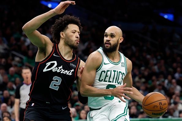 Boston, MA - December 28: Boston Celtics PG Derrick White drives in the lane. The Celtics beat the Detroit Pistons, 128-122, in overtime. (Photo by Danielle Parhizkaran/The Boston Globe via Getty Images)