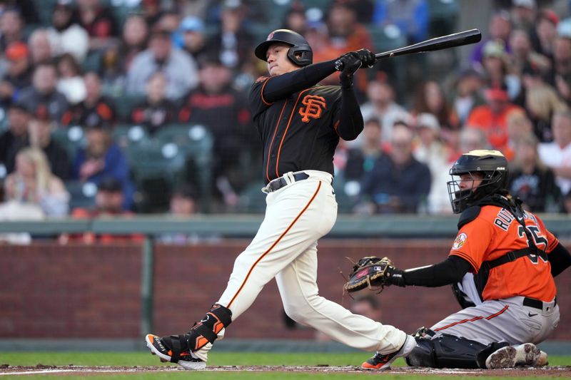 Jun 3, 2023; San Francisco, California, USA;  San Francisco Giants designated hitter Wilmer Flores (41) hits a double against the Baltimore Orioles during the first inning at Oracle Park. Mandatory Credit: Darren Yamashita-USA TODAY Sports