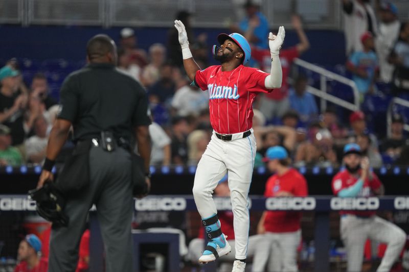 Aug 10, 2024; Miami, Florida, USA;  Miami Marlins right fielder Vidal Bruján (17) celebrates a home run in the fourth inning against the San Diego Padres at loanDepot Park. Mandatory Credit: Jim Rassol-USA TODAY Sports