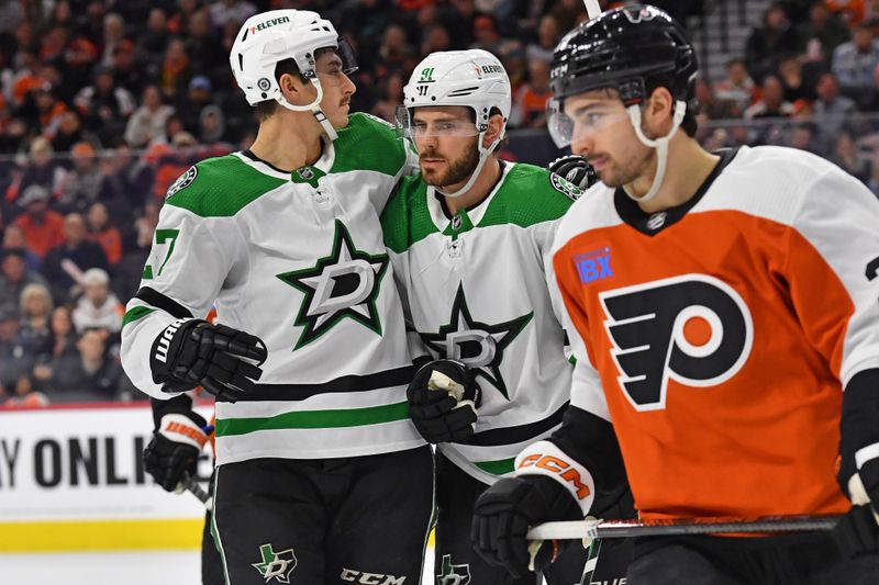 Jan 18, 2024; Philadelphia, Pennsylvania, USA; Dallas Stars center Tyler Seguin (91) celebrates his goal with left wing Mason Marchment (27) against the Philadelphia Flyers during the second period at Wells Fargo Center. Mandatory Credit: Eric Hartline-USA TODAY Sports