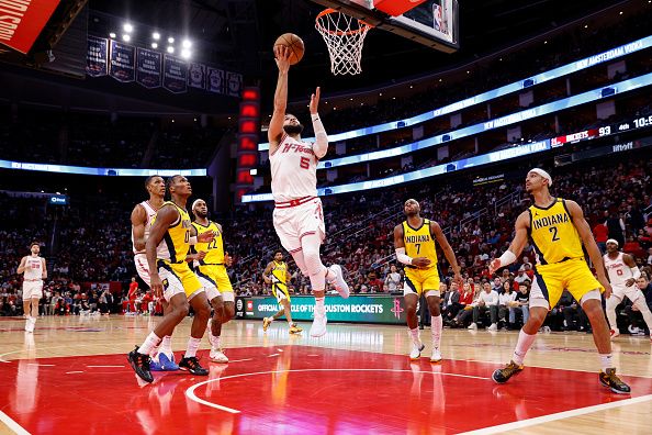 HOUSTON, TEXAS - DECEMBER 26: Fred VanVleet #5 of the Houston Rockets goes up for a shot in the second half against the Indiana Pacers at Toyota Center on December 26, 2023 in Houston, Texas.  NOTE TO USER: User expressly acknowledges and agrees that, by downloading and or using this photograph, User is consenting to the terms and conditions of the Getty Images License Agreement. (Photo by Tim Warner/Getty Images)