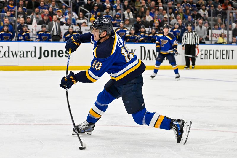 Jan 9, 2024; St. Louis, Missouri, USA;  St. Louis Blues center Brayden Schenn (10) shoots against the Florida Panthers during the second period at Enterprise Center. Mandatory Credit: Jeff Curry-USA TODAY Sports