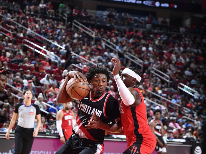 HOUSTON, TX - MARCH 25: Ashton Hagans #19 of the Portland Trail Blazers handles the ball during the game against the Houston Rockets on March 25, 2024 at the Toyota Center in Houston, Texas. NOTE TO USER: User expressly acknowledges and agrees that, by downloading and or using this photograph, User is consenting to the terms and conditions of the Getty Images License Agreement. Mandatory Copyright Notice: Copyright 2024 NBAE (Photo by Logan Riely/NBAE via Getty Images)