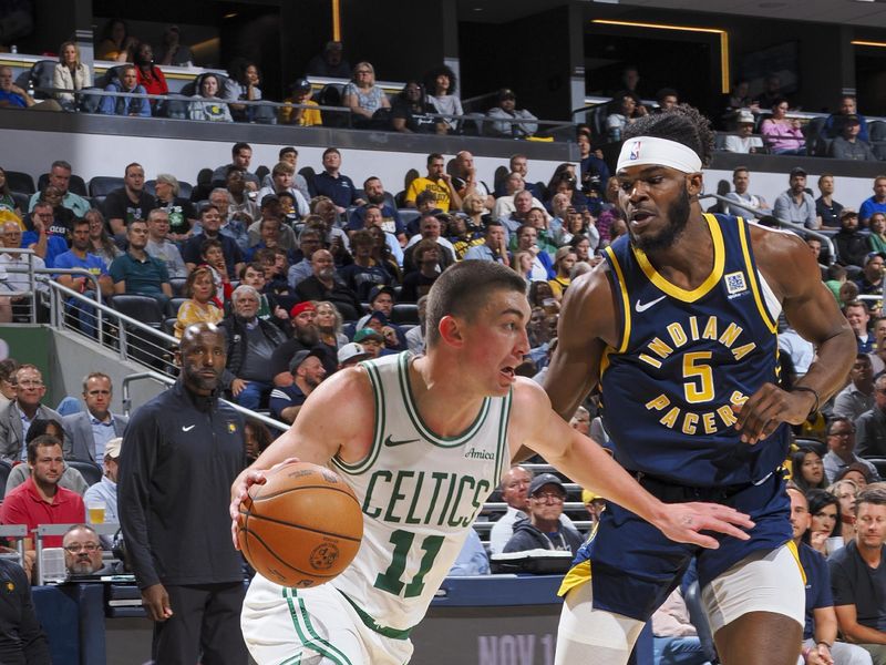 INDIANAPOLIS, IN - OCTOBER 30: Payton Pritchard #11 of the Boston Celtics dribbles the ball during the game against the Indiana Pacers on October 30, 2024 at Gainbridge Fieldhouse in Indianapolis, Indiana. NOTE TO USER: User expressly acknowledges and agrees that, by downloading and or using this Photograph, user is consenting to the terms and conditions of the Getty Images License Agreement. Mandatory Copyright Notice: Copyright 2024 NBAE (Photo by Ron Hoskins/NBAE via Getty Images)