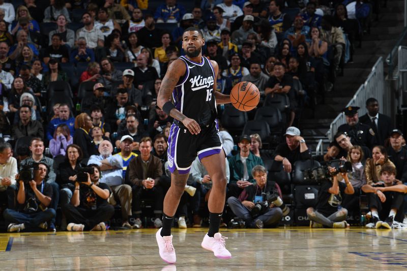 SAN FRANCISCO, CA - OCTOBER 11: Mason Jones #15 of the Sacramento Kings dribbles the ball during the game against the Golden State Warriors during a NBA Preseason game on October 11, 2024 at Chase Center in San Francisco, California. NOTE TO USER: User expressly acknowledges and agrees that, by downloading and or using this photograph, user is consenting to the terms and conditions of Getty Images License Agreement. Mandatory Copyright Notice: Copyright 2024 NBAE (Photo by Noah Graham/NBAE via Getty Images)