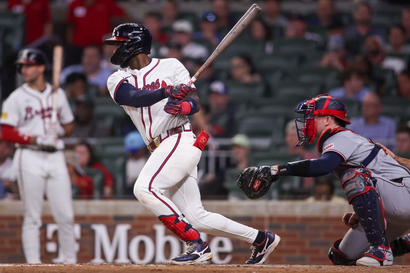Sep 22, 2025; Atlanta, Georgia, USA; Atlanta Braves left fielder Jurickson Profar (7) hits an RBI single against the Washington Nationals in the sixth inning at Truist Park. Mandatory Credit: Brett Davis-Imagn Images
