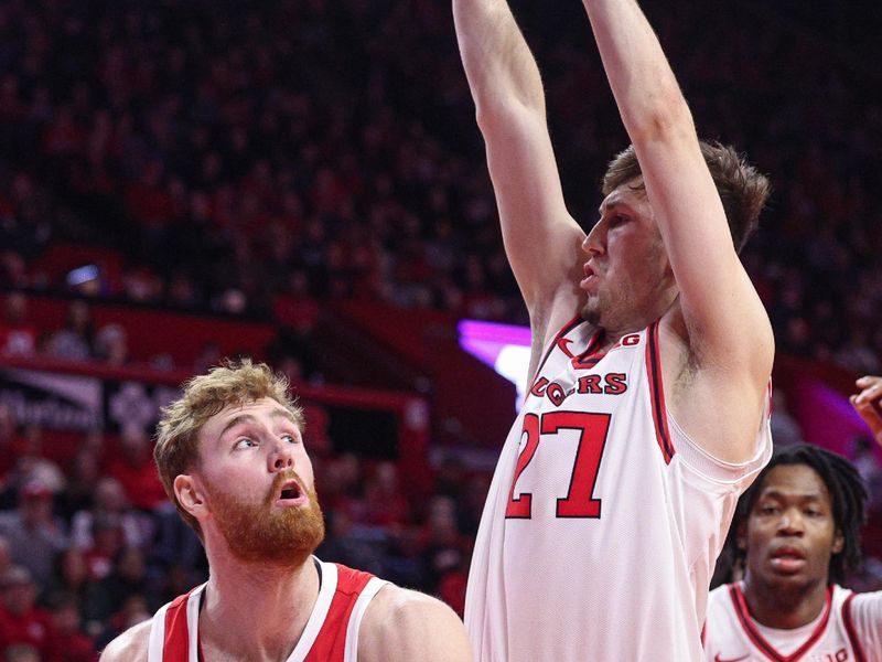 Jan 2, 2026; Piscataway, New Jersey, USA; Ohio State Buckeyes forward Brandon Noel (14) looks to the basket as Rutgers Scarlet Knights forward Denis Badalau (27) defends during the first half at Jersey Mike's Arena. Mandatory Credit: Vincent Carchietta-Imagn Images