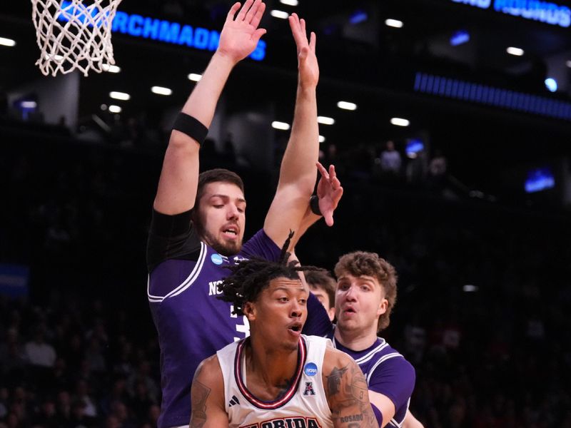 March 22, 2024, Brooklyn, NY, USA; Florida Atlantic Owls forward Giancarlo Rosado (3) looks to pass away from Northwestern Wildcats guard Ty Berry (3) in the first round of the 2024 NCAA Tournament at the Barclays Center. Mandatory Credit: Robert Deutsch-USA TODAY Sports