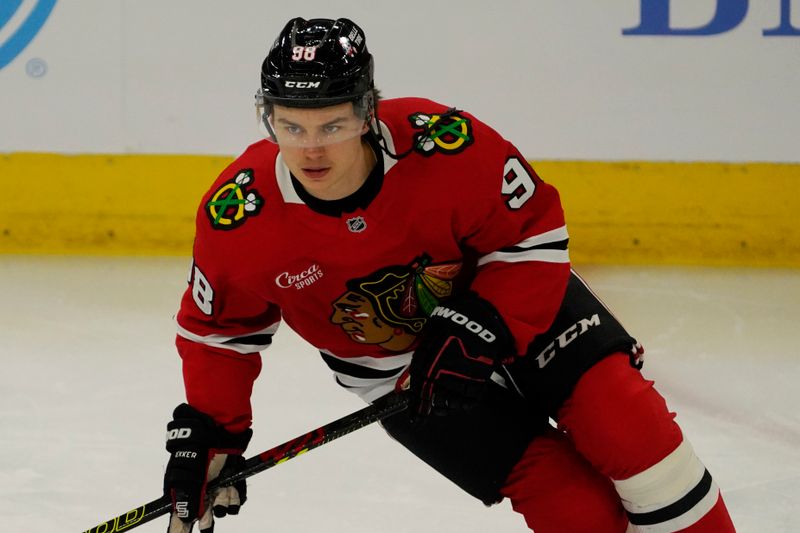 Nov 27, 2024; Chicago, Illinois, USA; Chicago Blackhawks center Connor Bedard (98) warms up before a game against the Dallas Stars at United Center. Mandatory Credit: David Banks-Imagn Images