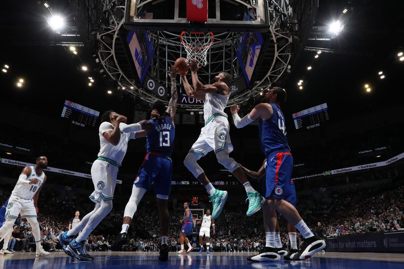 MINNEAPOLIS, MN -  MARCH 3: Rudy Gobert #27 of the Minnesota Timberwolves drives to the basket during the game against the LA Clippers on March 3, 2024 at Target Center in Minneapolis, Minnesota. NOTE TO USER: User expressly acknowledges and agrees that, by downloading and or using this Photograph, user is consenting to the terms and conditions of the Getty Images License Agreement. Mandatory Copyright Notice: Copyright 2024 NBAE (Photo by Jordan Johnson/NBAE via Getty Images)