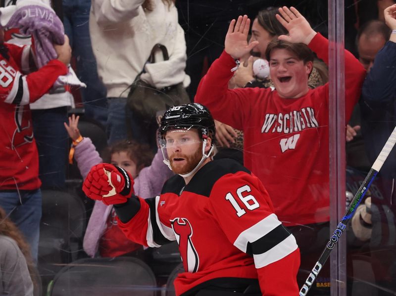 Oct 26, 2025; Newark, New Jersey, USA; New Jersey Devils right wing Connor Brown (16) celebrates his goal against the Colorado Avalanche during the second period at Prudential Center. Mandatory Credit: Ed Mulholland-Imagn Images