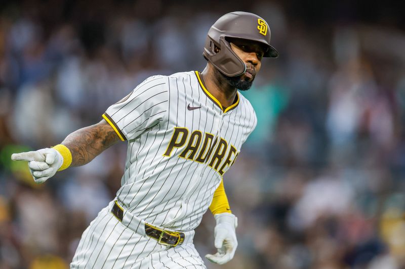 Apr 12, 2025; San Diego, California, USA; San Diego Padres left fielder Jason Heyward (22) points to the dugout after hitting a one-run home run during the fifth inning against the Colorado Rockies at Petco Park. Mandatory Credit: David Frerker-Imagn Images