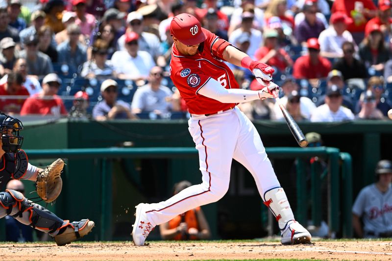 May 21, 2023; Washington, District of Columbia, USA; Washington Nationals designated hitter Joey Meneses (45) singles against the Detroit Tigers during the second inning at Nationals Park. Mandatory Credit: Brad Mills-USA TODAY Sports