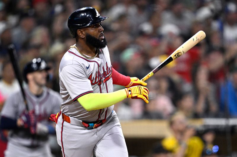 Jul 12, 2024; San Diego, California, USA; Atlanta Braves designated hitter Marcell Ozuna (20) hits a home run against the San Diego Padres during the ninth inning at Petco Park. Mandatory Credit: Orlando Ramirez-USA TODAY Sports