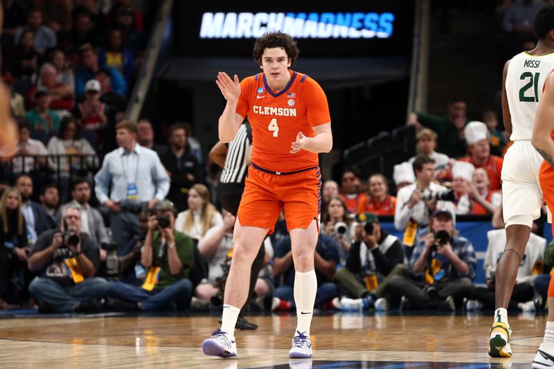 Mar 24, 2024; Memphis, TN, USA; Clemson Tigers forward Ian Schieffelin (4) celebrates in the first half against the Baylor Bears in the second round of the 2024 NCAA Tournament at FedExForum. Mandatory Credit: Petre Thomas-USA TODAY Sports