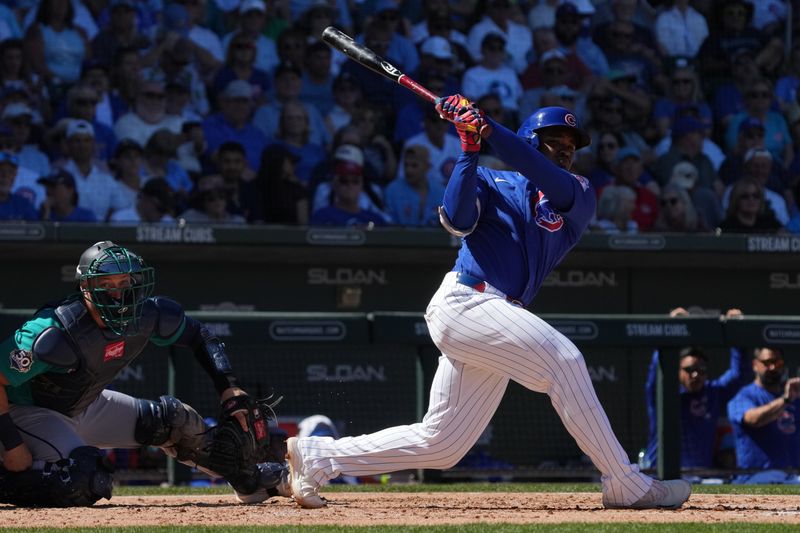 Mar 12, 2026; Mesa, Arizona, USA; Chicago Cubs third baseman BJ Murray (83) hits against the Seattle Mariners in the third inning at Sloan Park. Mandatory Credit: Rick Scuteri-Imagn Images