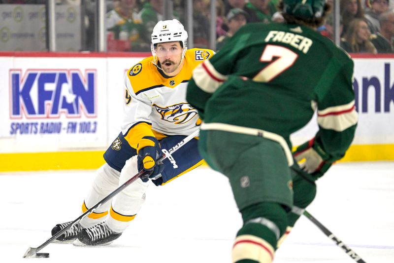 Jan 25, 2024; Saint Paul, Minnesota, USA; Nashville Predators forward Filip Forsberg (9) controls the puck against the Minnesota Wild during the first period at Xcel Energy Center. Mandatory Credit: Nick Wosika-USA TODAY Sports