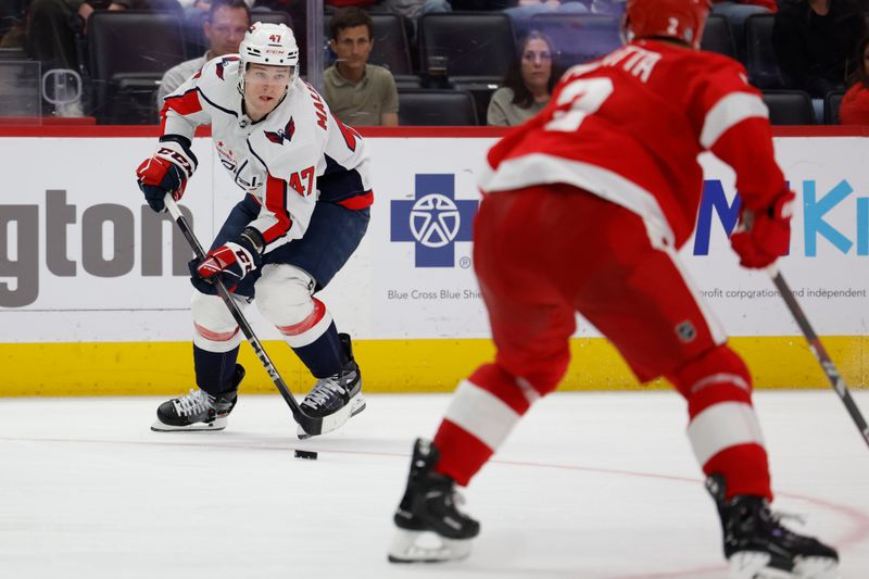 Apr 9, 2024; Detroit, Michigan, USA; Washington Capitals left wing Beck Malenstyn (47) skates with the puck in the third period against the Detroit Red Wings at Little Caesars Arena. Mandatory Credit: Rick Osentoski-USA TODAY Sports