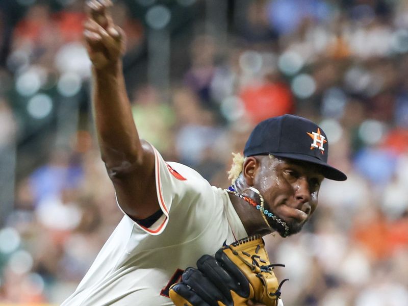 Apr 13, 2024; Houston, Texas, USA; Houston Astros pitcher Ronel Blanco (56) pitches against the Texas Rangers in the first inning at Minute Maid Park. Mandatory Credit: Thomas Shea-USA TODAY Sports