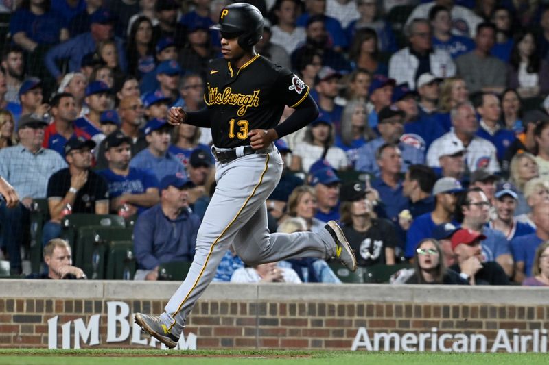 Sep 20, 2023; Chicago, Illinois, USA; Pittsburgh Pirates third baseman Ke'Bryan Hayes (13) scores against the Chicago Cubs during the fourth inning  at Wrigley Field. Mandatory Credit: Matt Marton-USA TODAY Sports