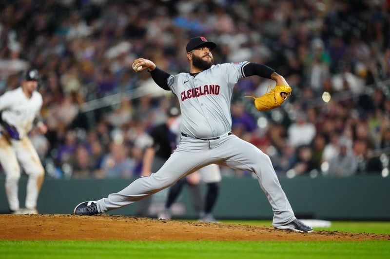 May 29, 2024; Denver, Colorado, USA; Cleveland Guardians relief pitcher Pedro Avila (60) eighth inning against the Colorado Rockies at Coors Field. Mandatory Credit: Ron Chenoy-USA TODAY Sports