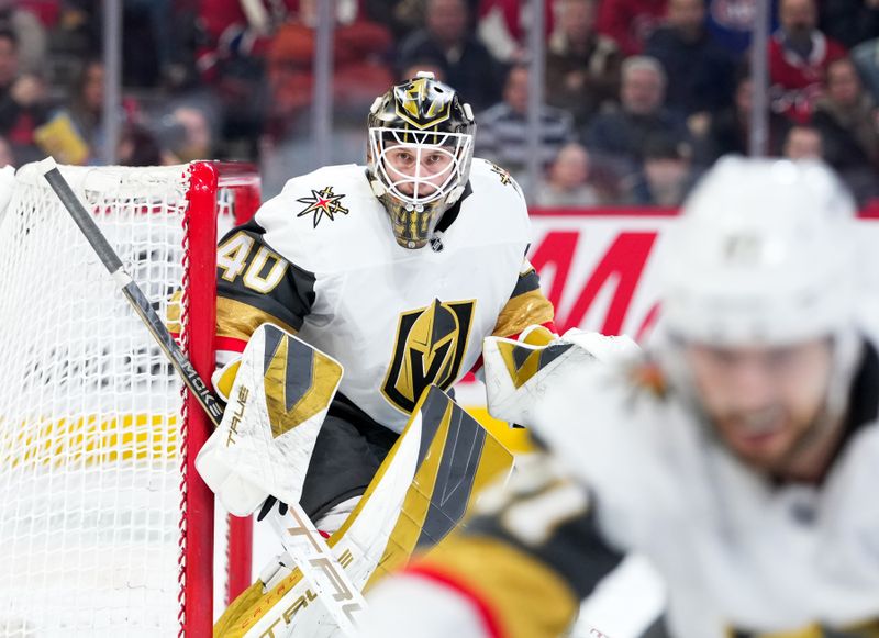 Jan 27, 2026; Montreal, Quebec, CAN; Vegas Golden Knights goalie Akira Schmid (40) tracks the play during the second period of the game against the Montreal Canadiens  at the Bell Centre. Mandatory Credit: Eric Bolte-Imagn Images