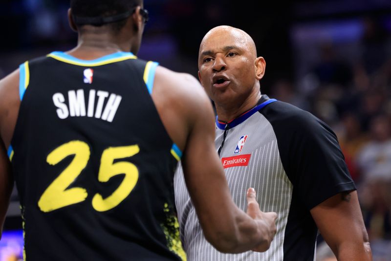 INDIANAPOLIS, INDIANA - MARCH 16: Jalen Smith #25 of the Indiana Pacers speaks with referee Kevin Cutler #34 during the second half in the game against the Brooklyn Nets at Gainbridge Fieldhouse on March 16, 2024 in Indianapolis, Indiana. NOTE TO USER: User expressly acknowledges and agrees that, by downloading and or using this photograph, User is consenting to the terms and conditions of the Getty Images License Agreement. (Photo by Justin Casterline/Getty Images)